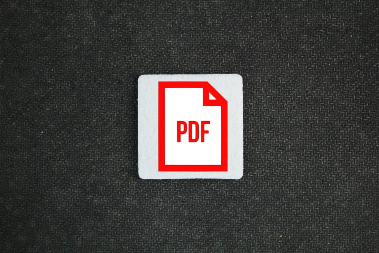 Pdf sticker on black background.