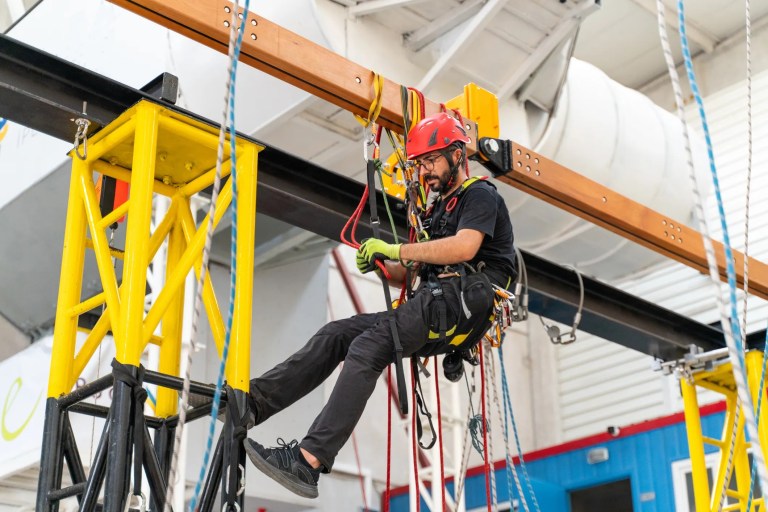 Rope Access Technician is working with ANSI/ASSE fall protection.