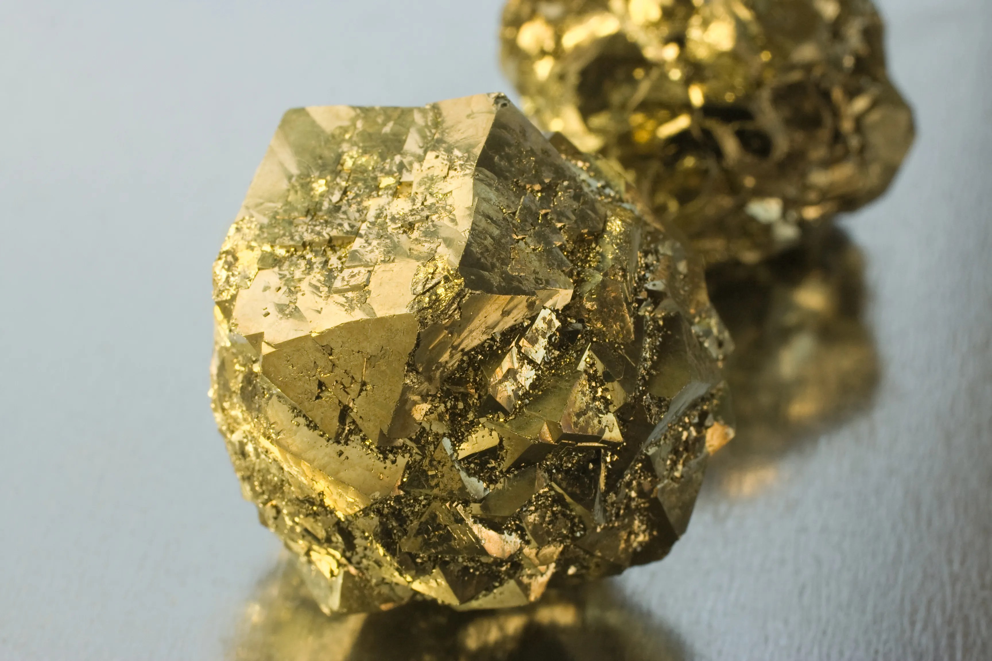 Two chunks of pyrite (fool's gold)