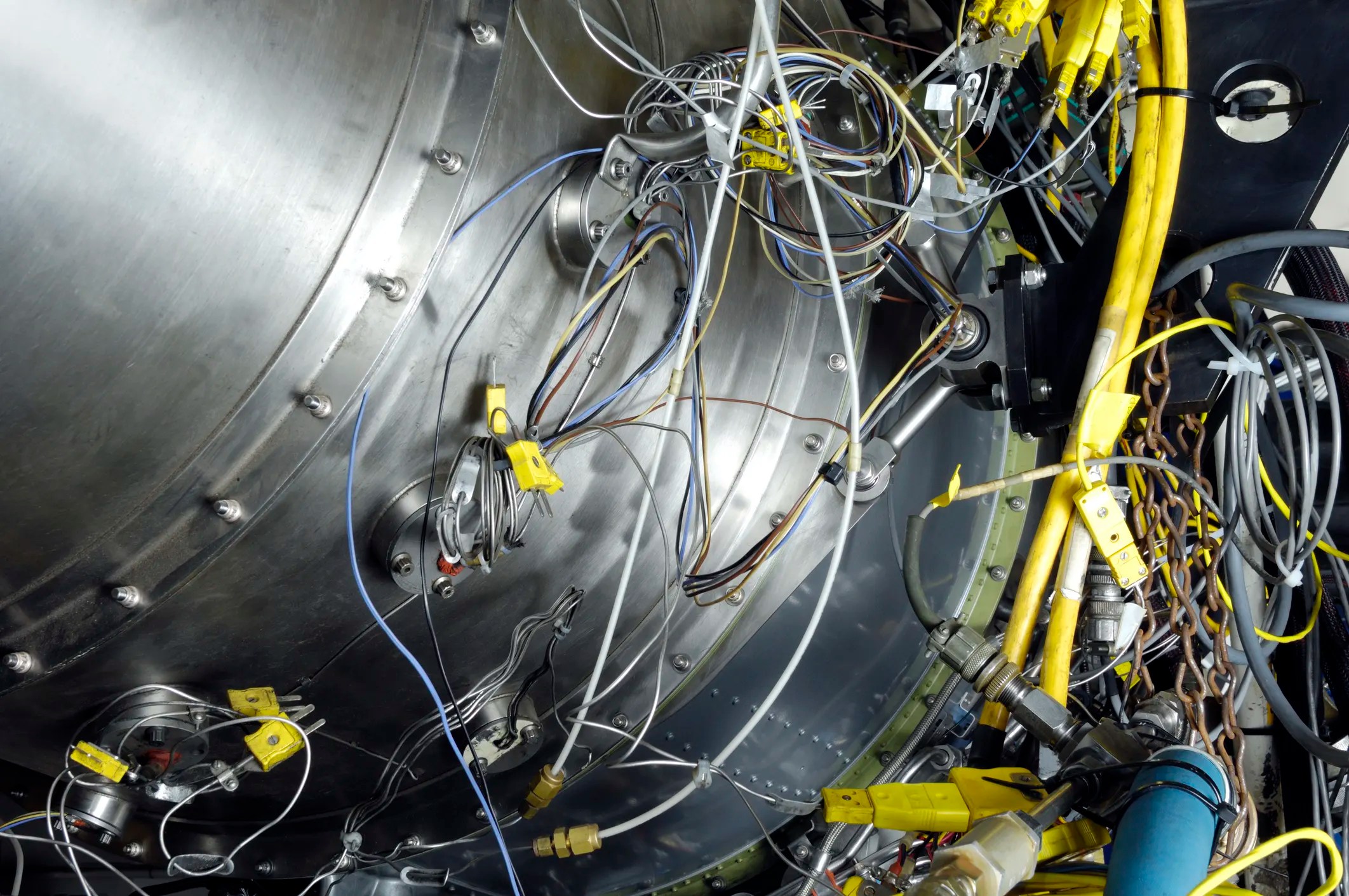 Wires visible outside of a metal aerospace turbine
