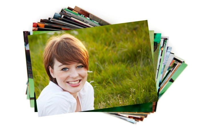Stack of ISO 20462-1 photos with smiling woman in grass on top