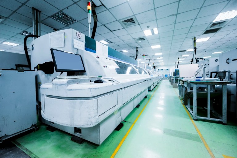 An ISO 14644-1 electric boards circuit plant with green floor