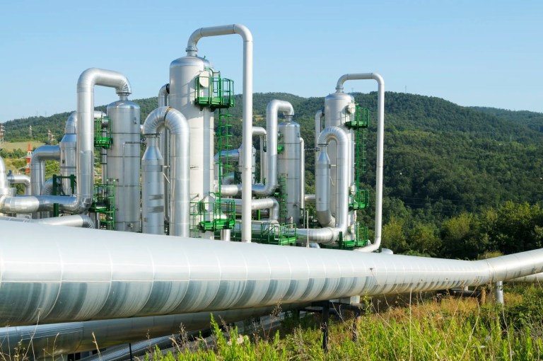 Geothermal energy plant in green surroundings
