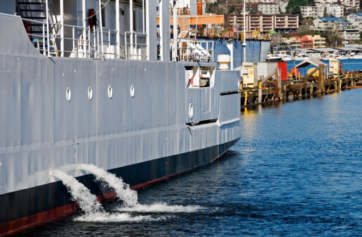 Discharging ballast water into lake from ISO 16145-1 painted steel ship