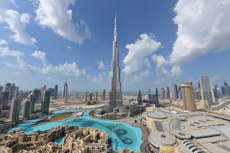Burj Khalifa surrounded by skyscrapers in Dubai
