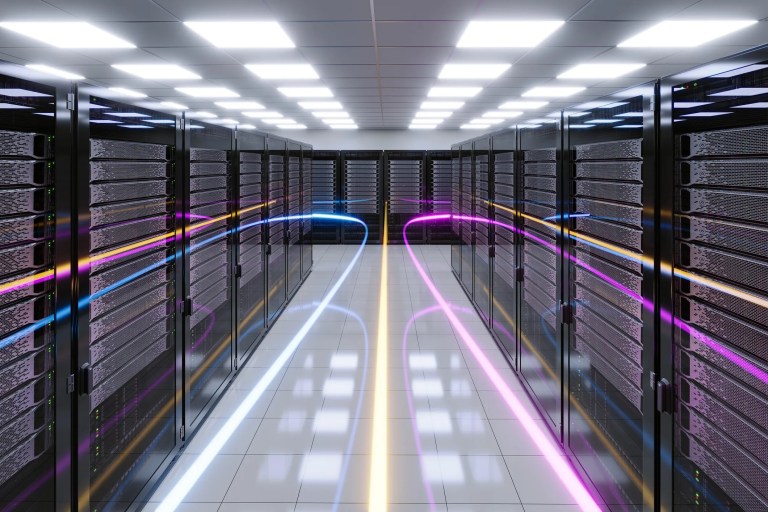Data center with colorful lines passing through to show data silos in the IoT