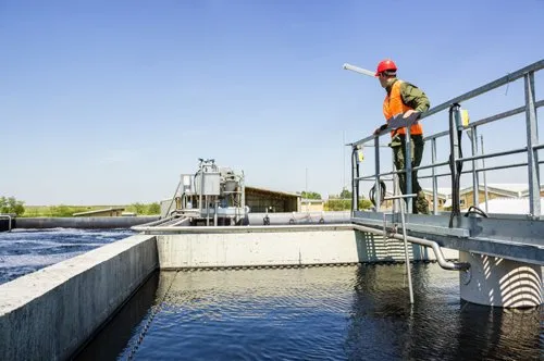 Wastewater treatment facility that follows requirements set by wastewater treatment standards