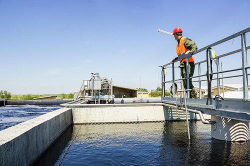 Wastewater treatment facility that follows requirements set by wastewater treatment standards