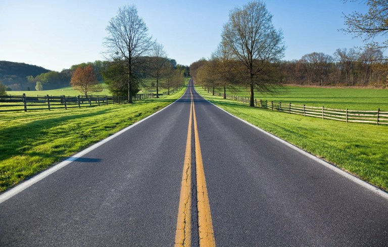 Country road passing through old US highway following DOT policies