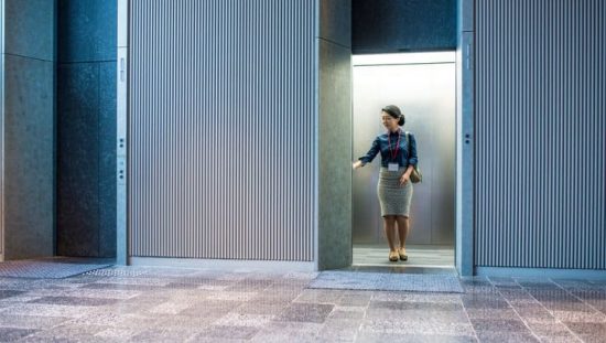 A woman in an elevator