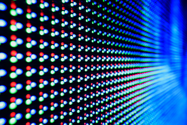 A closeup of colorful IEC 62922 organic light emitting diodes (OLEDs) organized together on a TV.