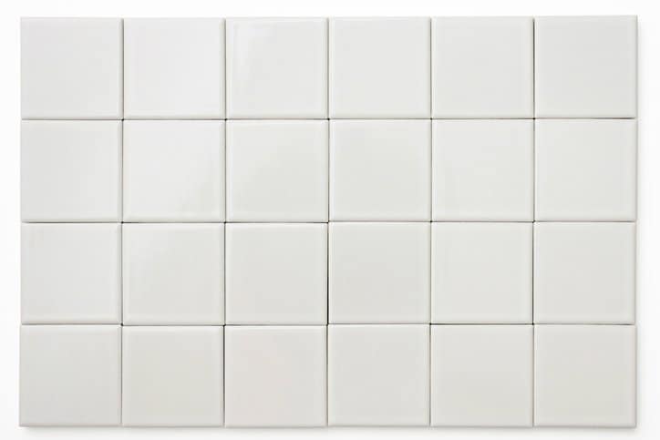White ceramic tile that has been tested by ASTM C485-16
