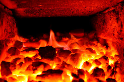 Burning coke regulated by ASTM D121-15