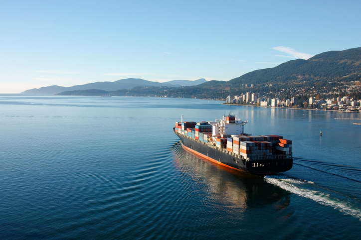 Container ship that has been tested by ASTM D4728-17 is sailing on water