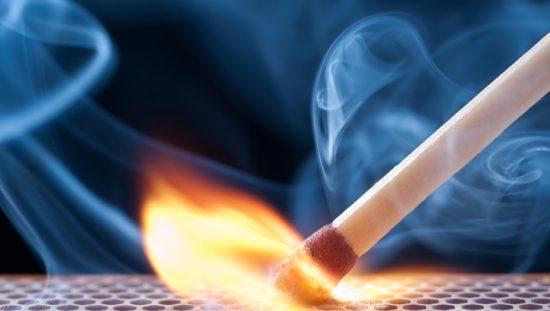 A match lighting on fire