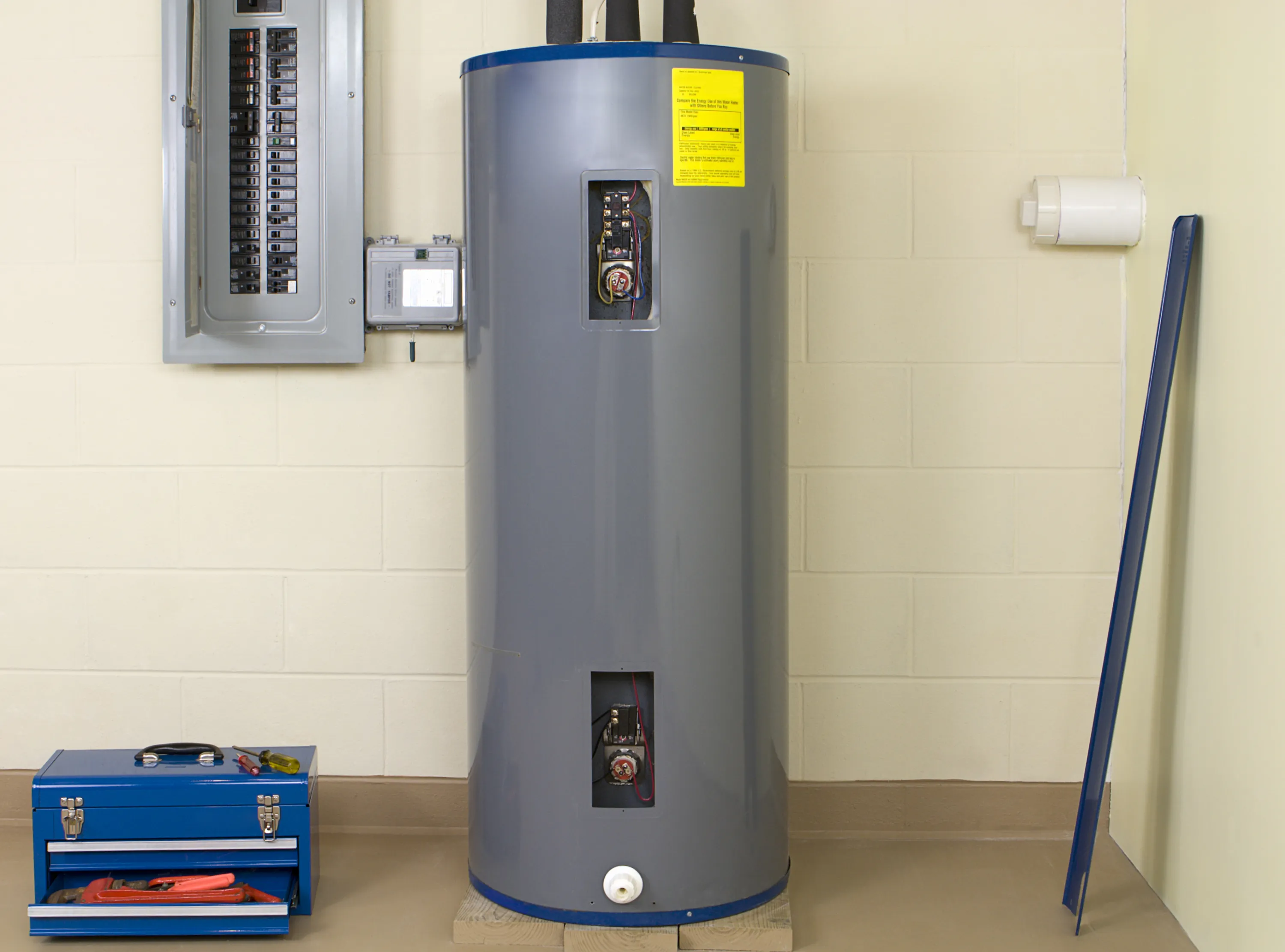 A gray residential water heater under ANSI Z21.10/CSA 4 repairs.