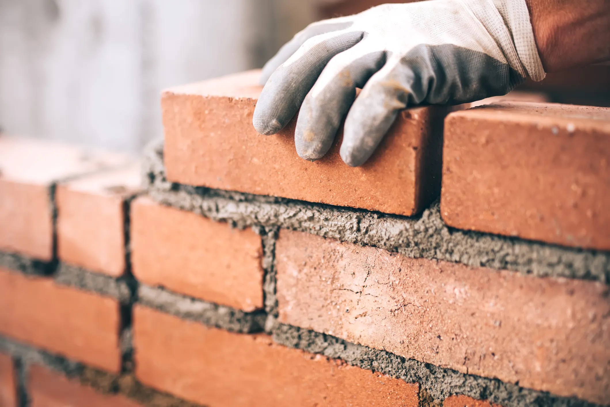 Laying brick with materials of the Unified Soil Classification in ASTM D2487-17