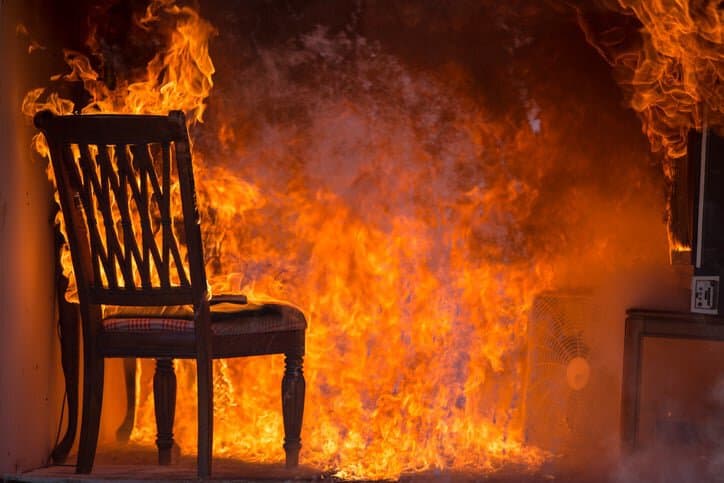 A chair on fire where a water mist fire prevention system that's specified by NFPA 750 2019 would come in handy