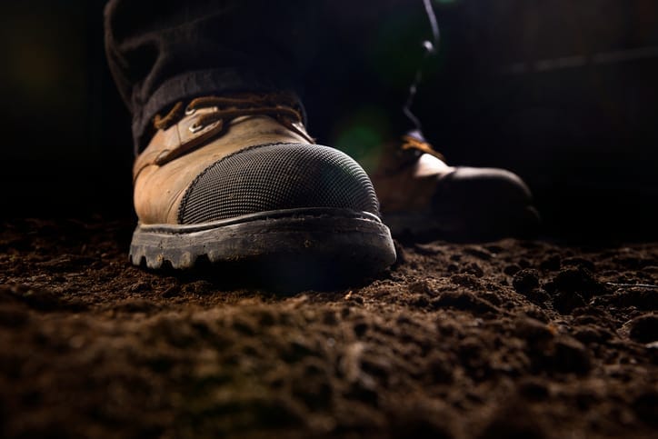 Brown boots tested to ASTM F2412-18 and staying reliable even in the darkness.