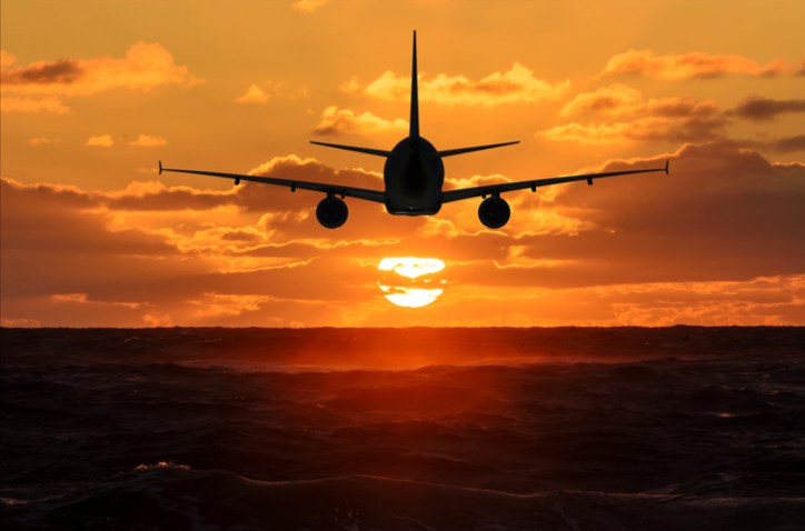 Plane ascending into the sunset thanks to its ceramic matric composites (CMCs) construction.