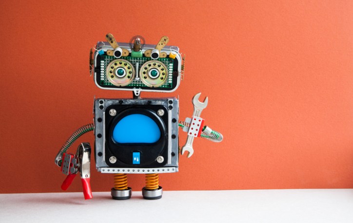 Robot made of various parts and exposed gears to symbolize ISO IEC 29147 2018