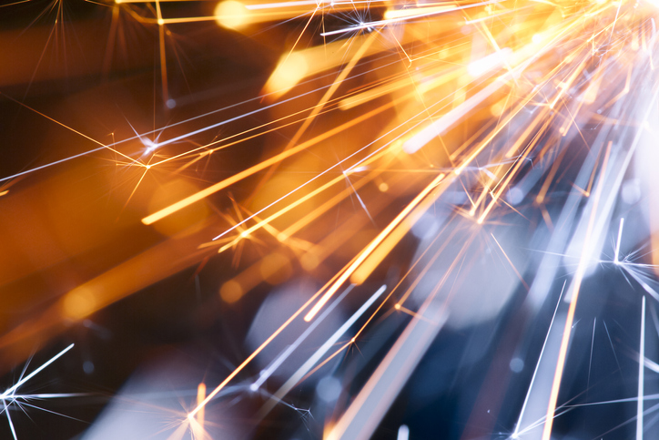 Sparks flying off of metal that is covered in NFPA 484 2019
