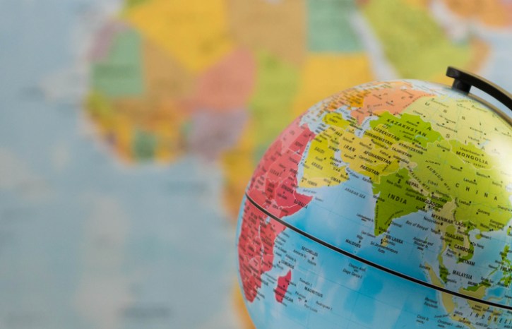 Globe of the world with a map in the background