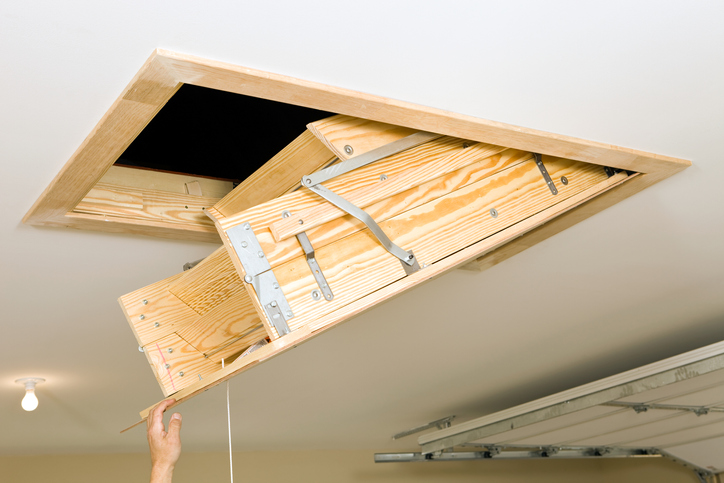 An ANSI-ASC A14.9-2019 disappearing attic stairway collapses into a ceiling.