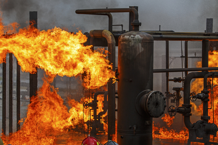 A petroleum plant on fire that did not follow NFPA 69-2019 explosion prevention systems
