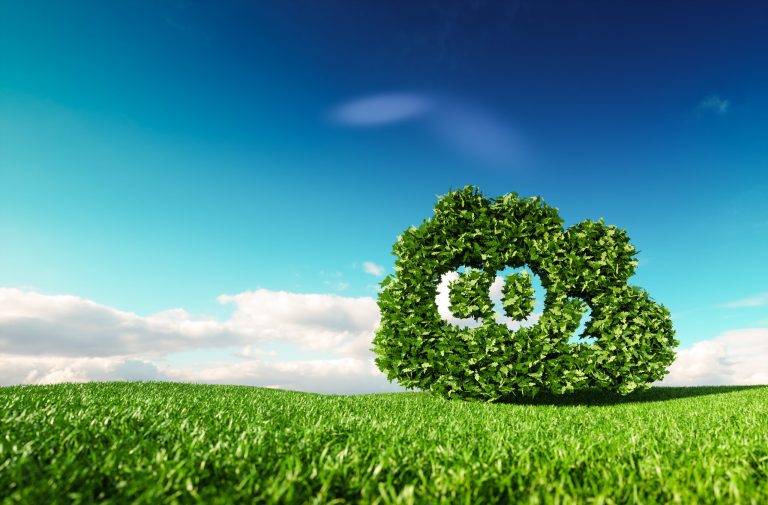 Carbon dioxide emissions control concept. 3d rendering of co2 cloud on fresh spring meadow with blue sky in background.. Greenhouse Gases, co2, harmful emissions