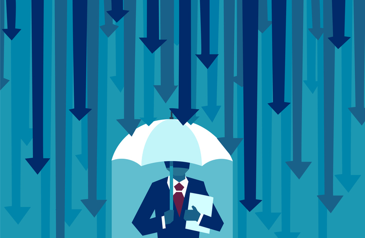 Man with an umbrella that is shielding him from the downpour of arrows to represent IEC 31010:2019