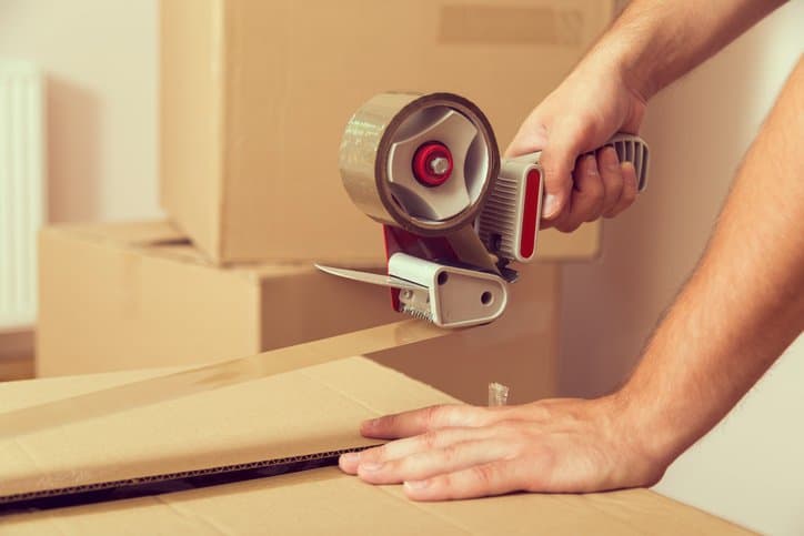 Testing out the peel adhesion of tape with ASTM D3330 over a packaging box