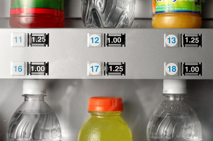 Drinks Plenty of cold drinks priced differently in a NSF/ANSI 25-2017 vending machine.
