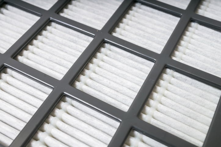 White filtration device with steel panes tested for ASHRAE 52.2 MERV general ventilation.