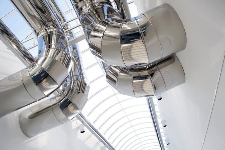 Silver chrome air ducts that follow ASHRAE standards.
