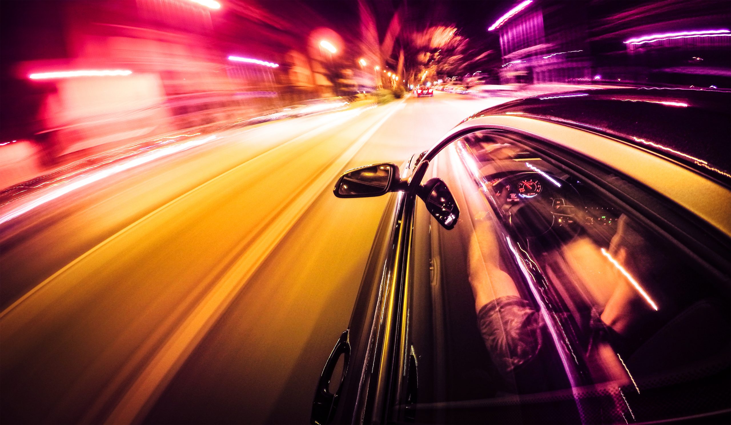 Psychedelic car breezing through road, colorful from measured SAE J 2805-2020 sound emissions