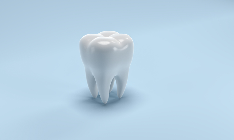 Visualized bright tooth on blue background with no adhesion problems thanks to ANSI/ADA 111-2019 testing