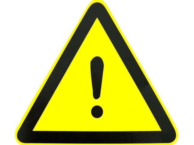 A yellow warning sign displayed on products through ANSI Z535.