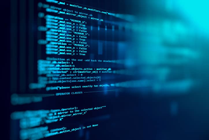 Plenty of blue code representing an ISO 27001 information security management system (ISMS).