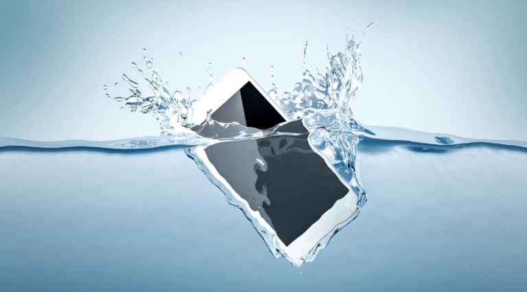 A smartphone plummets into the water and is destroyed due to a low IP Code rating under IEC 60529.