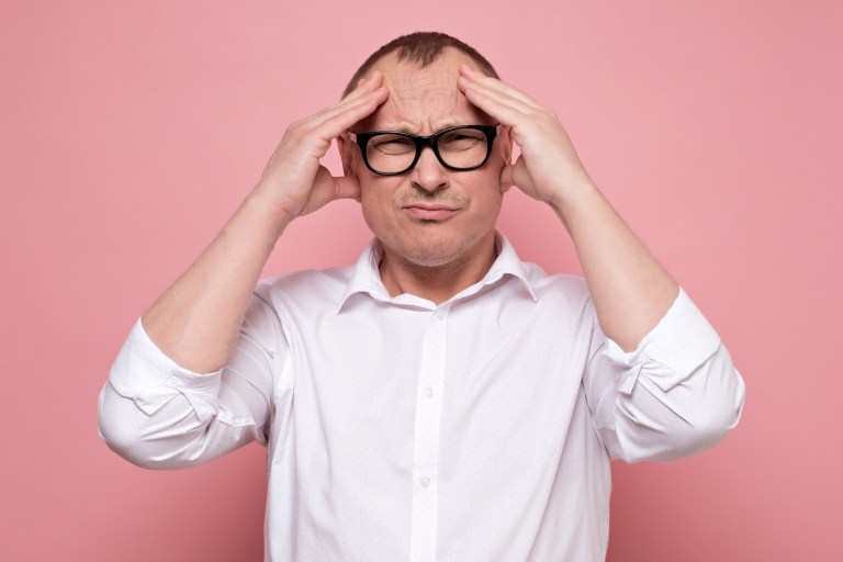 Customer upset on pink background and ready to complain about an ISO/IEC 17025 accredited laboratory.