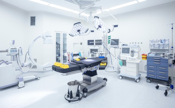 Vacant operating room has accredited testing laboratory products, via Accreditation Scheme for Conformity Assessment (ASCA).