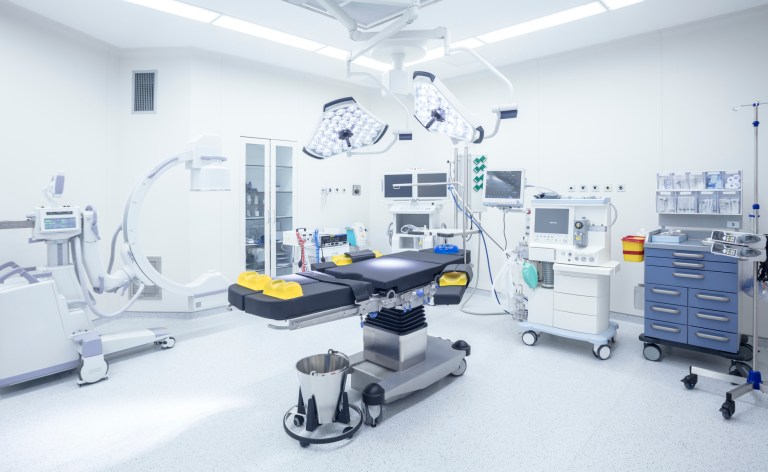 Vacant operating room has accredited testing laboratory products, via Accreditation Scheme for Conformity Assessment (ASCA).