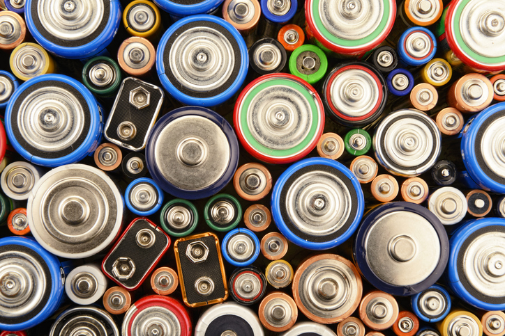 Bright colorful batteries that are being carefully recycled for sustainability purposes.