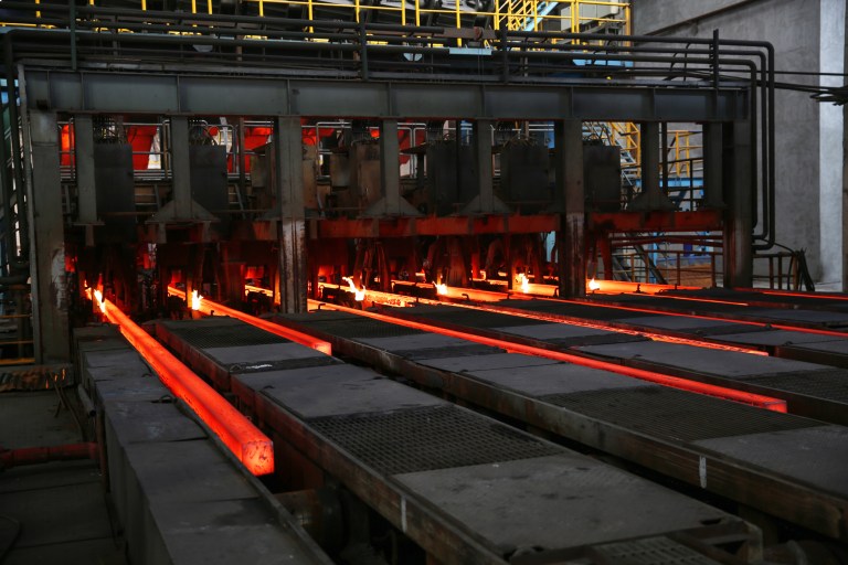 Red molten steel oozing and measured by AMS 2750F-2020 pyrometry specifications through ISO/IEC 17025 accreditation.
