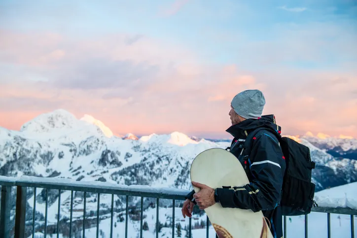 Former freestyle snowboarder overlooks sunset for backcountry action following the decline in attendance and participation.