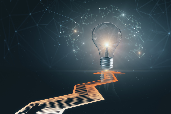 Using AI to drive the idea innovation management standard, ISO 56007, toward progress, via a lightbulb.