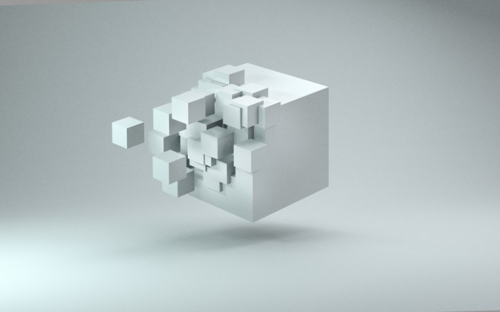 Small white blocks fit into cube like documented information with ISO 10013:2021 fits into quality management system.