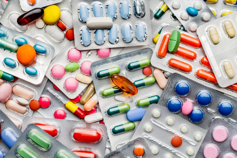 Dietary supplements scattered about but safe with Amazon seller requirements with ANAB accreditation security.