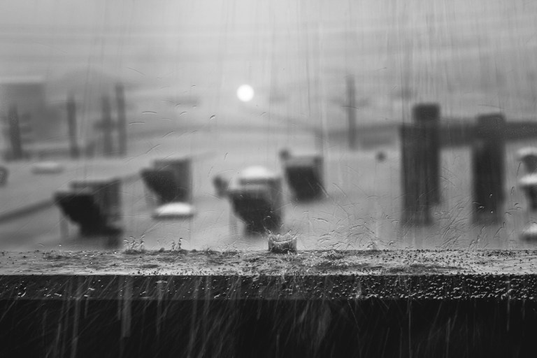 Rain accumulating on roof (ponding) in darkness and in need of ASCE-SEI 7-2022 drainage.
